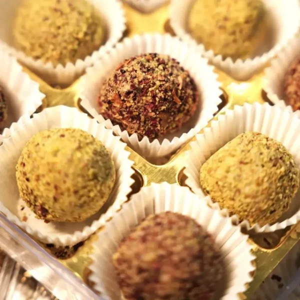 Buy Now Riha's Chocolates Rose Pista Laddoo pack of 15 pcs | Indian Sweets | No Sugar | Guilt Free - Image 2