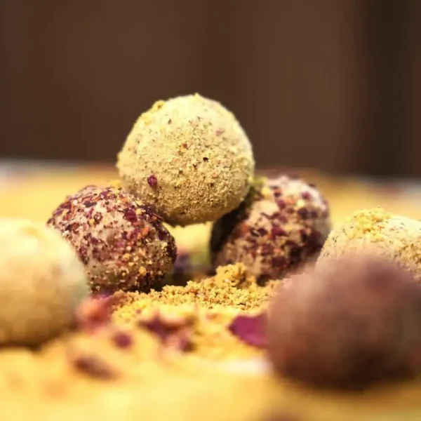 Buy Now Riha's Chocolates Rose Pista Laddoo pack of 15 pcs | Indian Sweets | No Sugar | Guilt Free - Image 3
